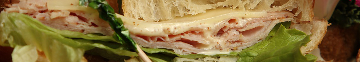 Eating Deli Italian Sandwich at Joe's Italian Deli Pork Store & Catering restaurant in Franklin Park, NJ.